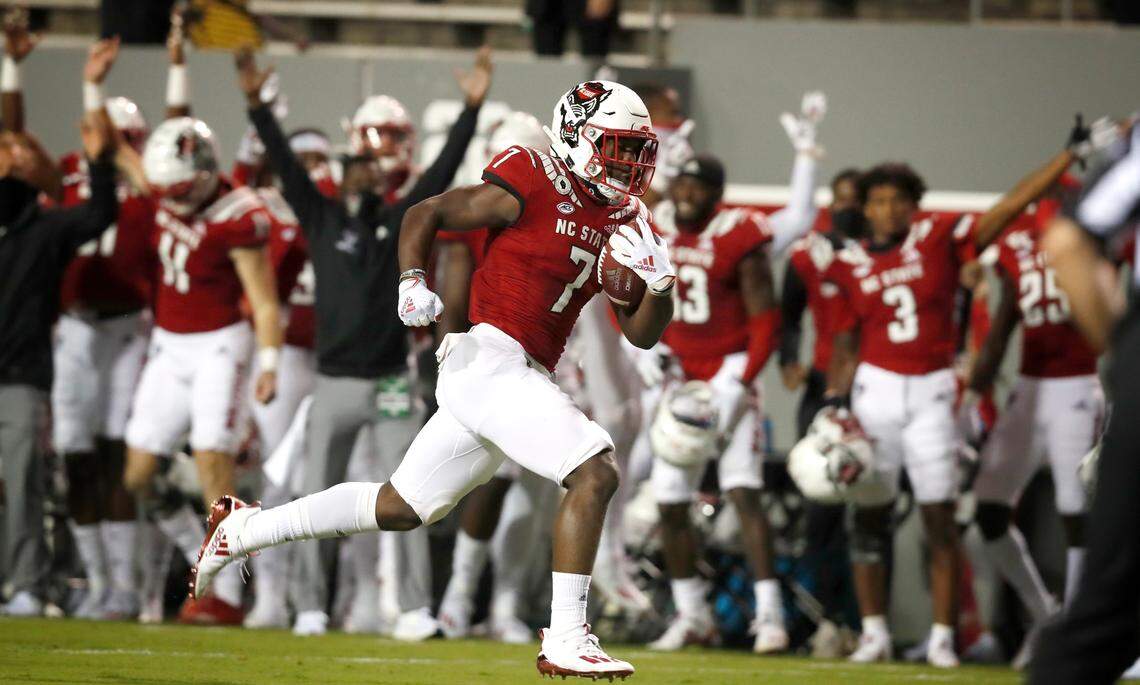 N.C. State running back Zonovan Knight (7) runs for a 30-yard touchdown during the first half of N.C. State’s game against Wake Forest at Carter-Finley Stadium in Raleigh, N.C, Saturday, Sept. 19, 2020.