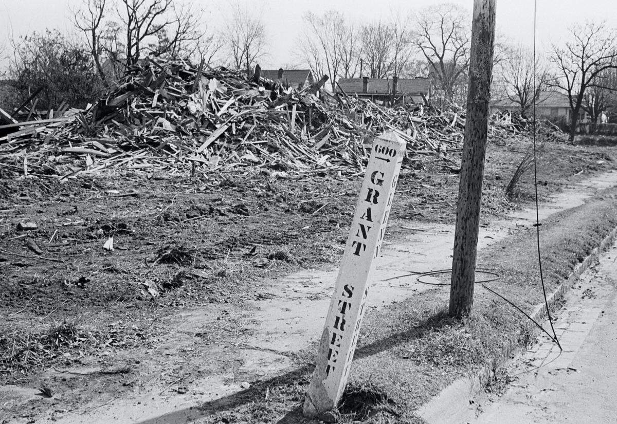What once were homes in the Hayti community along Grant Street are now nothing but piles of trash. The homes were destroyed as part of the Durham Urban Renewal project. (March 1966)