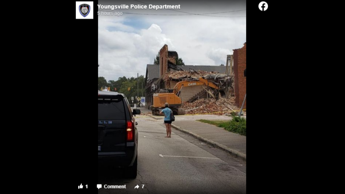 The building had to come down after part of it toppled, officials told news outlets.