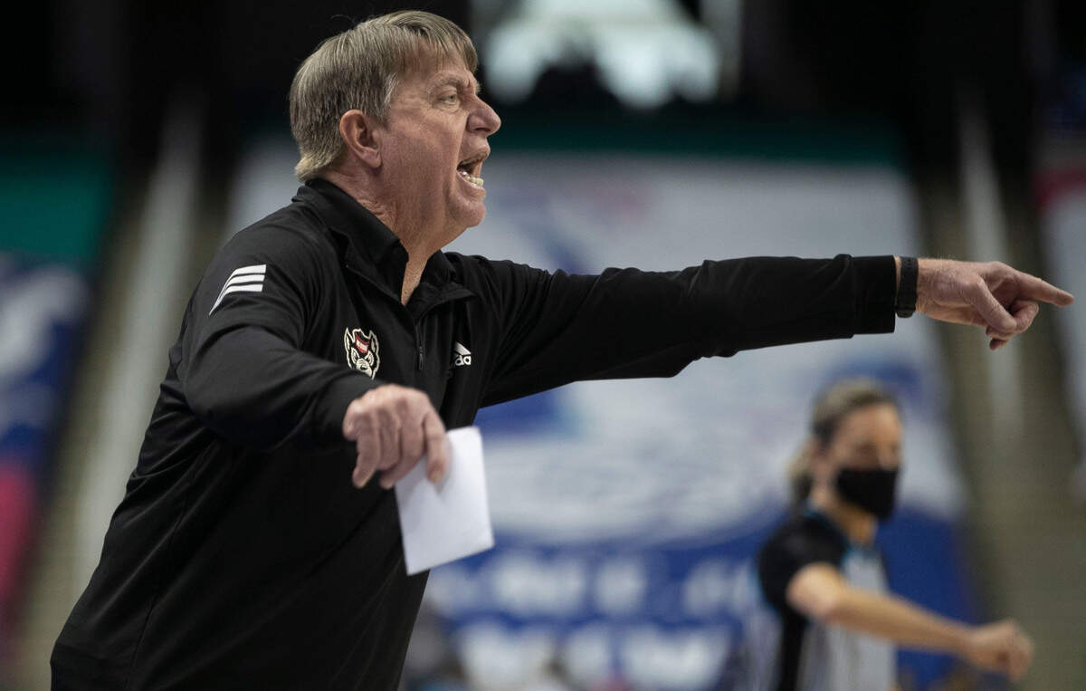 N.C. State coach Wes Moore directs his team in the first half against Florida State during the quarterfinal of the ACC Women’s Tournament on Friday, March 4, 2022 at the Greensboro Coliseum in Greensboro, N.C.