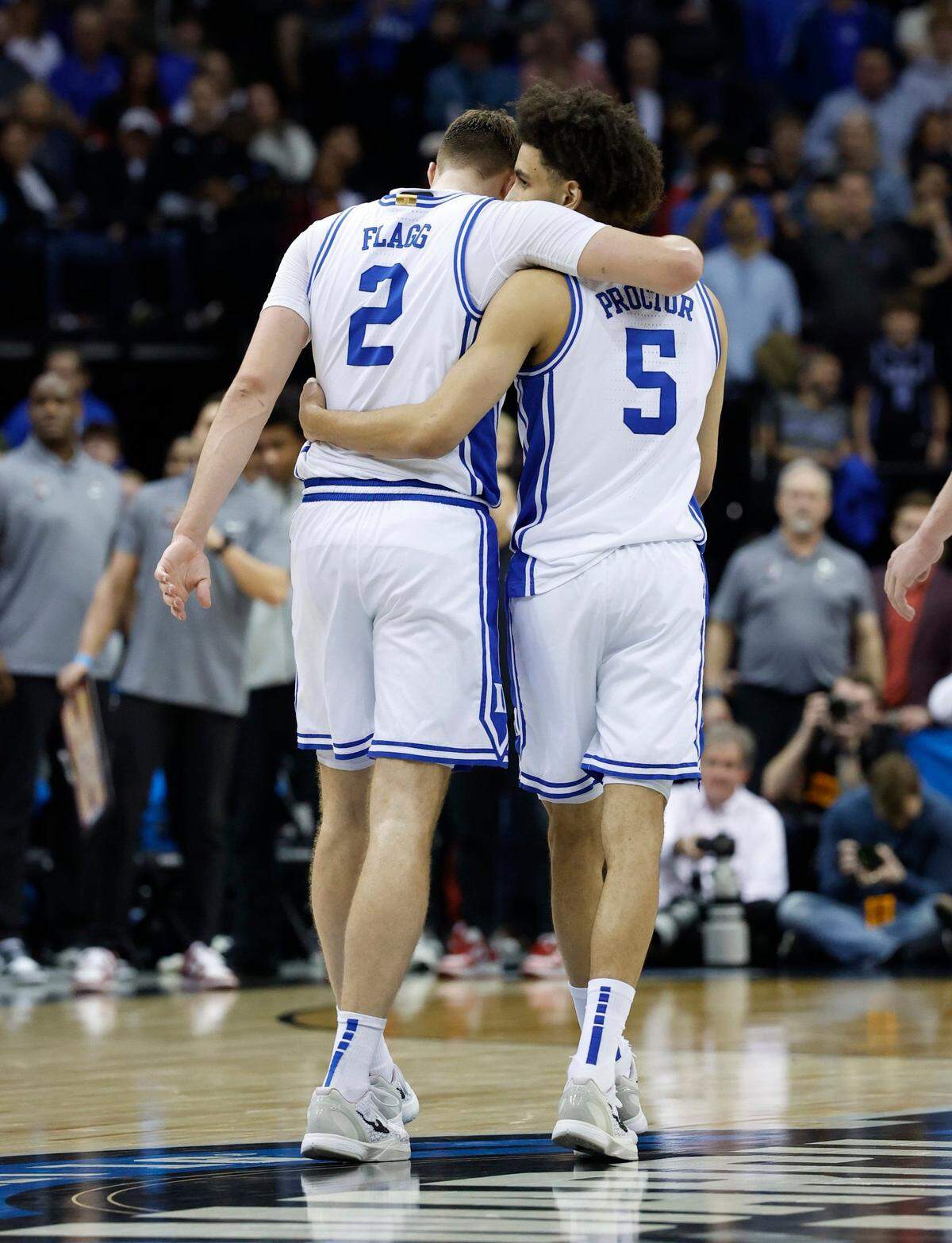 Duke’s Tyrese Proctor (5) talks to Cooper Flagg (2) during the second half of Duke’s 85-65 victory over Alabama in their Elite 8 game in the 2025 NCAA Men’s Basketball Championship at the Prudential Center in Newark, N.J., Saturday, March 29, 2025.