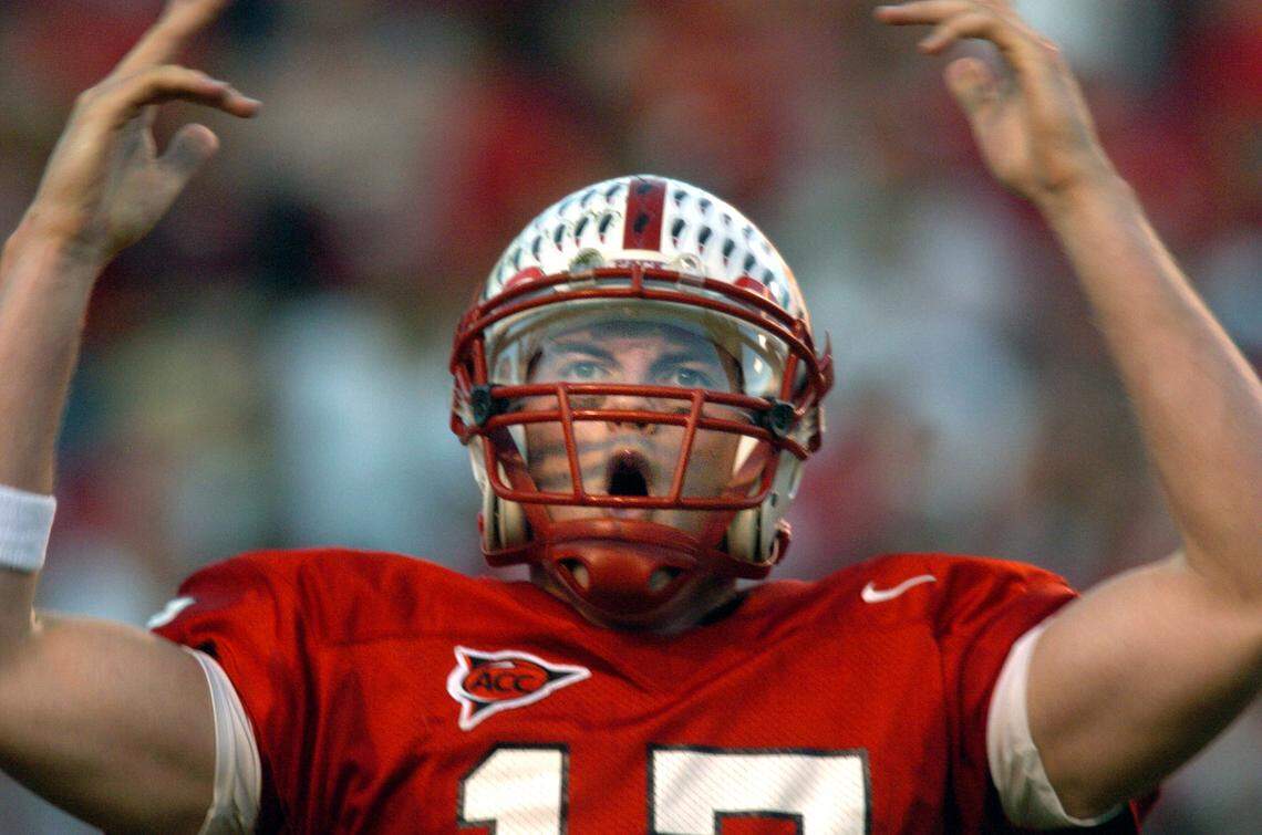 Philip Rivers gets the crowd motivated as he plays his final home game as the quarterback for the North Carolina State Wolfpack against Maryland in 2003.