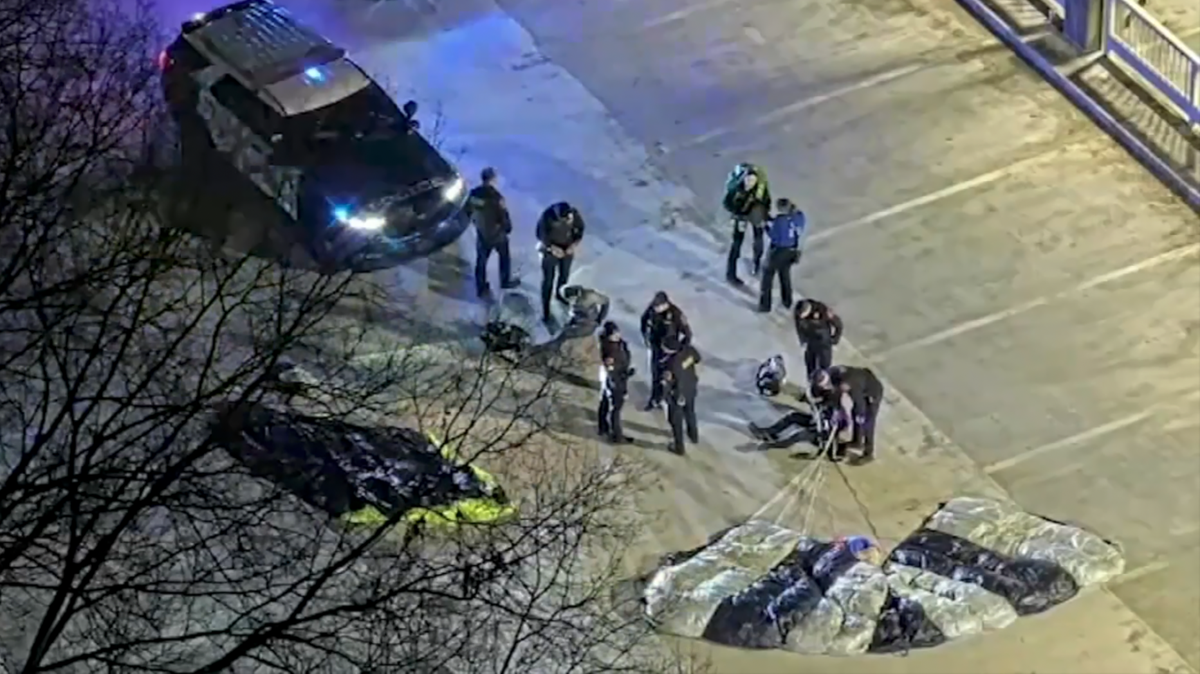 Two men are facing trespassing charges after kicking off Christmas Eve with an early-morning jump from a crane in downtown Raleigh, police said Tuesday.