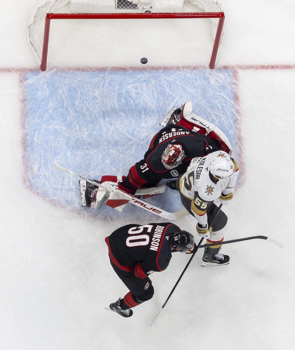 Carolina Hurricanes goalie Frederik Andersen (31) lets a shot by Las Vegas defenseman Shea Theodore (27) gets past him for the first Knights’ goal during the first period in Game 1 of the Stanley Cup Finals, on Tuesday, June 2, 2026 at Lenovo Center in Raleigh, N.C.