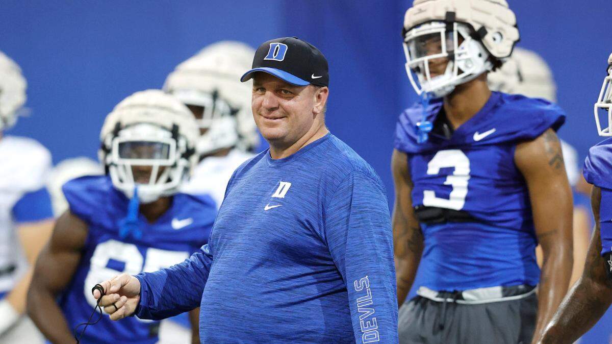 Duke head coach Mike Elko watches during the Blue Devils’ first practice of fall camp in Durham. N.C. Tuesday, August 2, 2022.