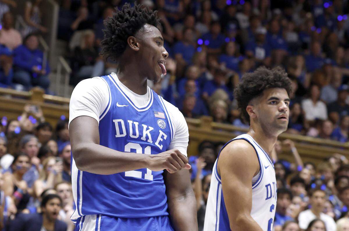 Duke’s Patrick Ngongba II (21) celebrates after making the basket while being fouled during Duke basketball’s Countdown to Craziness at Cameron Indoor Stadium in Durham, N.C., Friday, Oct. 3, 2025. Duke’s Cayden Boozer (2) is to the right.