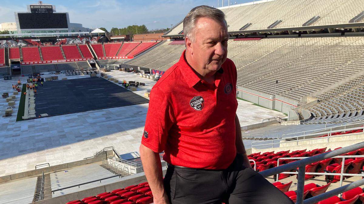 Carolina Hurricanes president and general manager Don Waddell discusses the NHL Stadium Series outdoor game as work on rink continues at NC State’s Carter-Finley Stadium. (Chip Alexander)