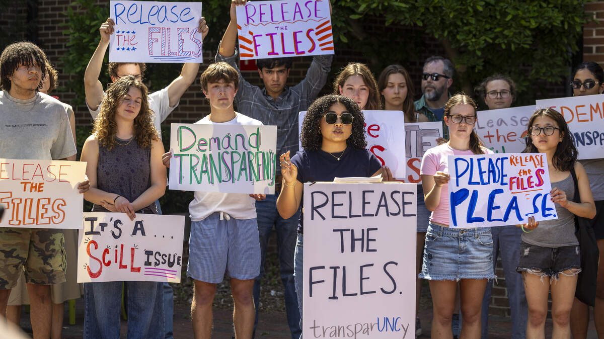 Kaveya Wertz, a UNC-Chapel Hill student and member of TransparUNCy, speaks during a press conference hosted by faculty and students Friday, April 17, 2026, outside Banks D. Kerr Hall on campus prior to a Faculty Council meeting. The group urges Chancellor Lee Roberts to release the $1.2 million SCiLL investigation, citing transparency, public records and campus accountability.