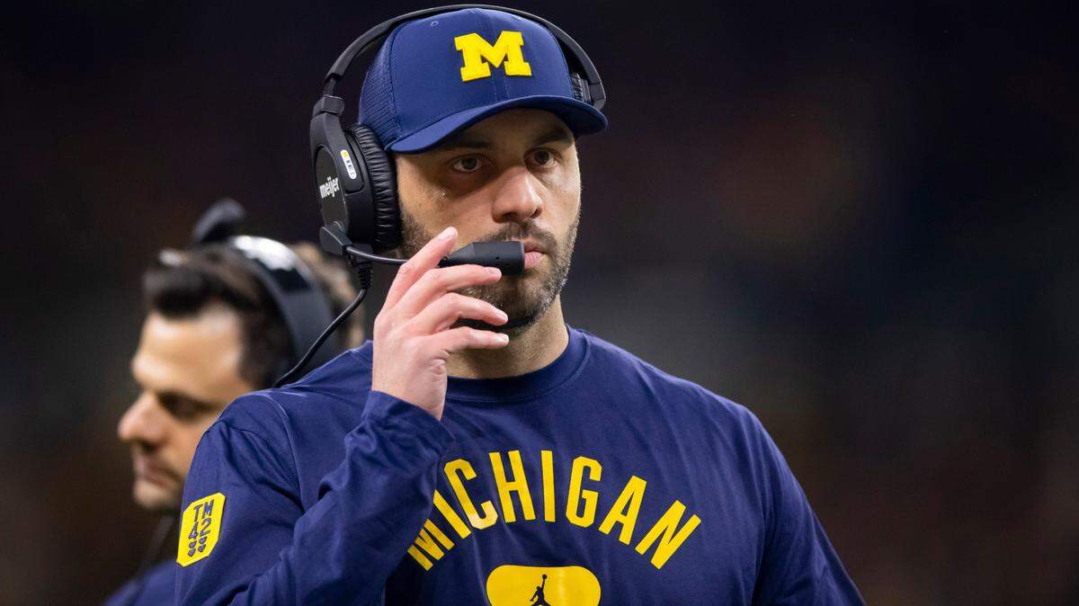 Michigan Wolverines quarterbacks coach Matt Weiss seen in a game against the Iowa Hawkeyes during the Big Ten Conference championship game at Lucas Oil Stadium in Dec. 2021.