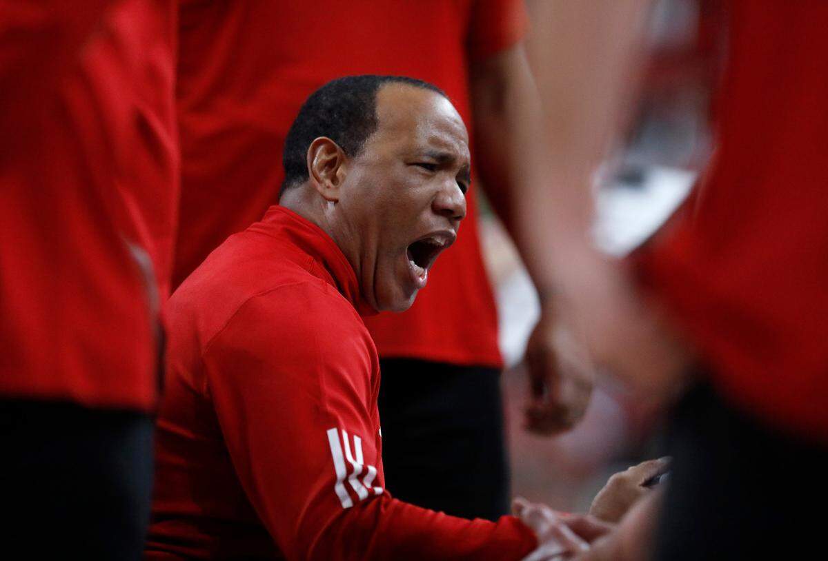 N.C. State head coach Kevin Keatts speaks with his team during a timeout in the second half of the Wolfpack’s 84-61 win over William & Mary at Lenovo Center on Friday, Nov. 22, 2024, in Raleigh, N.C.