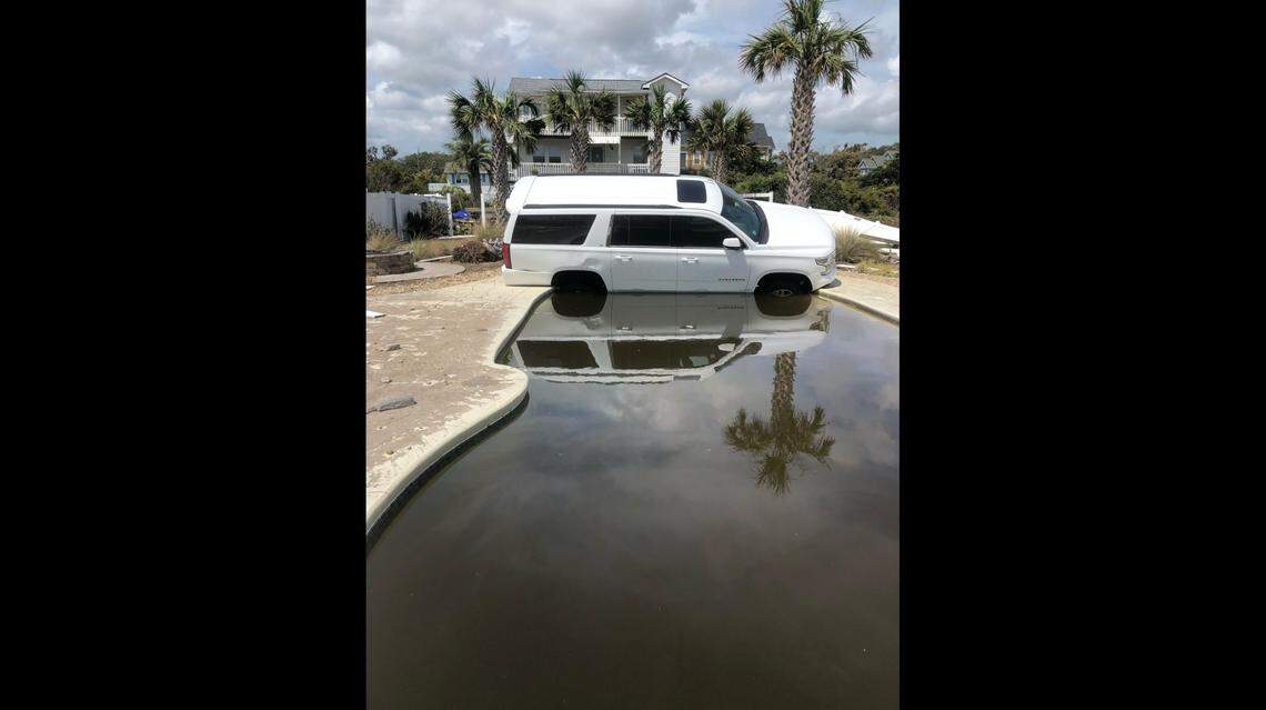 This SUV showed up teetering on the edge of a pool on Oak Island, N.C., after Hurricane Isaias passed.