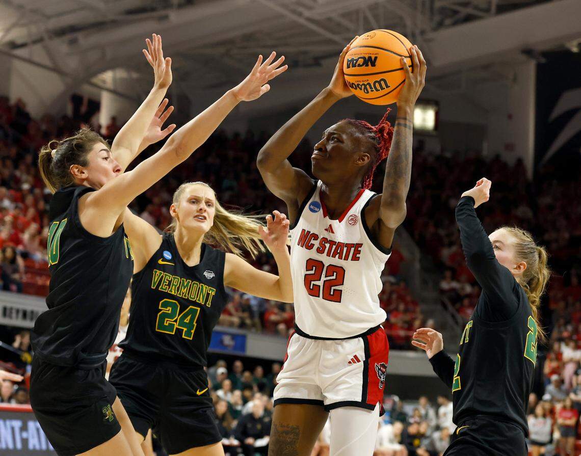 N.C. State’s Saniya Rivers looks to shoot over Vermont’s Bella Vito and Anna Olson during the second half of the Wolfpack’s 75-55 win in the first round of the NCAA Tournament on Saturday, March 22, 2025, at Reynolds Coliseum in Raleigh, N.C.