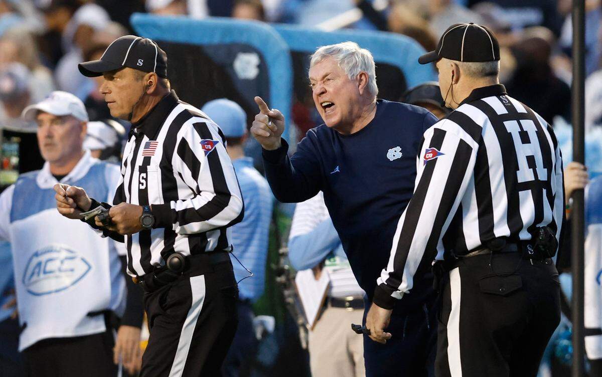 North Carolina head coach Mack Brown has words with the officials during the first half of N.C. State’s game against UNC at Kenan Stadium in Chapel Hill, N.C., Friday, Nov. 25, 2022.