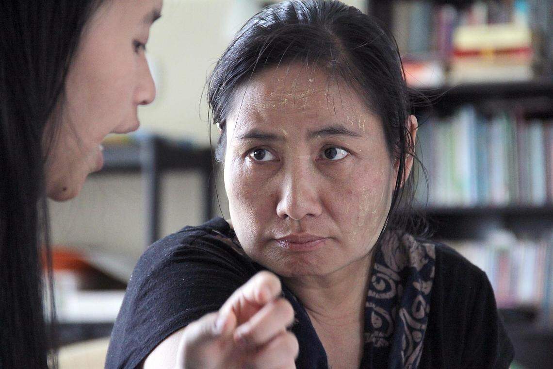 From left, Paw Ray, 19, tutors fellow Karen refugee Sirrthert, 40, from Burma (also known as Myanmar) in a citizenship class Tuesday, April 19, 2016, offered by the Refugee Support Center in Carrboro, N.C.