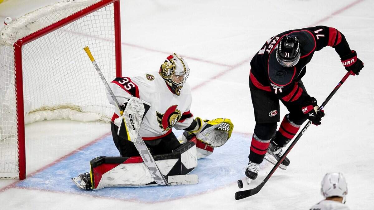 The Carolina Hurricanes Jesper Fast (71) works to score on Ottawa goalie Leevi Merilainen (35) during the third period on Tuesday, April 4, 2023 at PNC Arena in Raleigh, N.C.