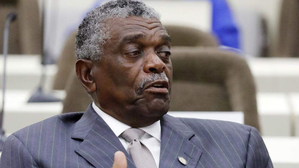 NC House Rep. Elmer Floyd (D-Cumberland) talks with another member before a House Rules Committee meeting held at the Legislative Office Building in Raleigh on June 14, 2018.