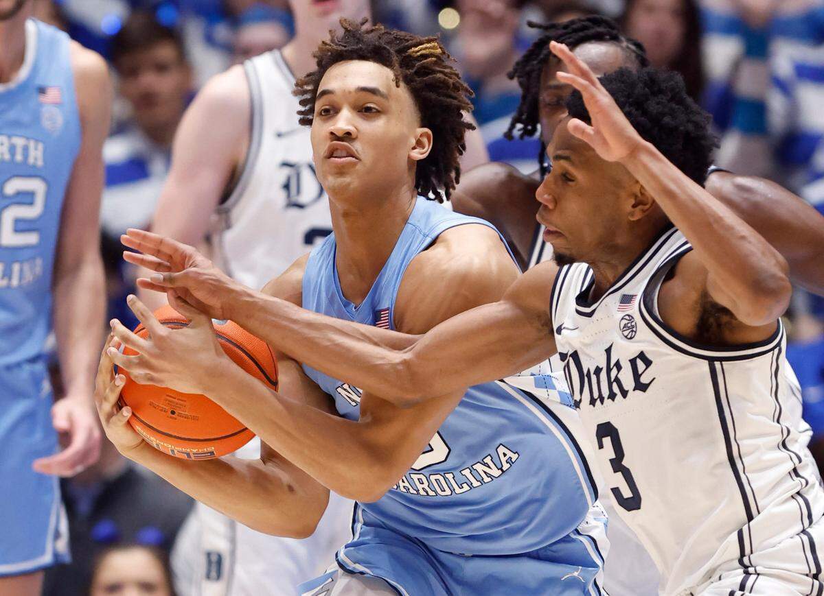 Duke’s Jeremy Roach (3) fouls North Carolina’s Seth Trimble (0) during the first half of Duke’s game against UNC at Cameron Indoor Stadium in Durham, N.C., Saturday, Feb. 4, 2023.