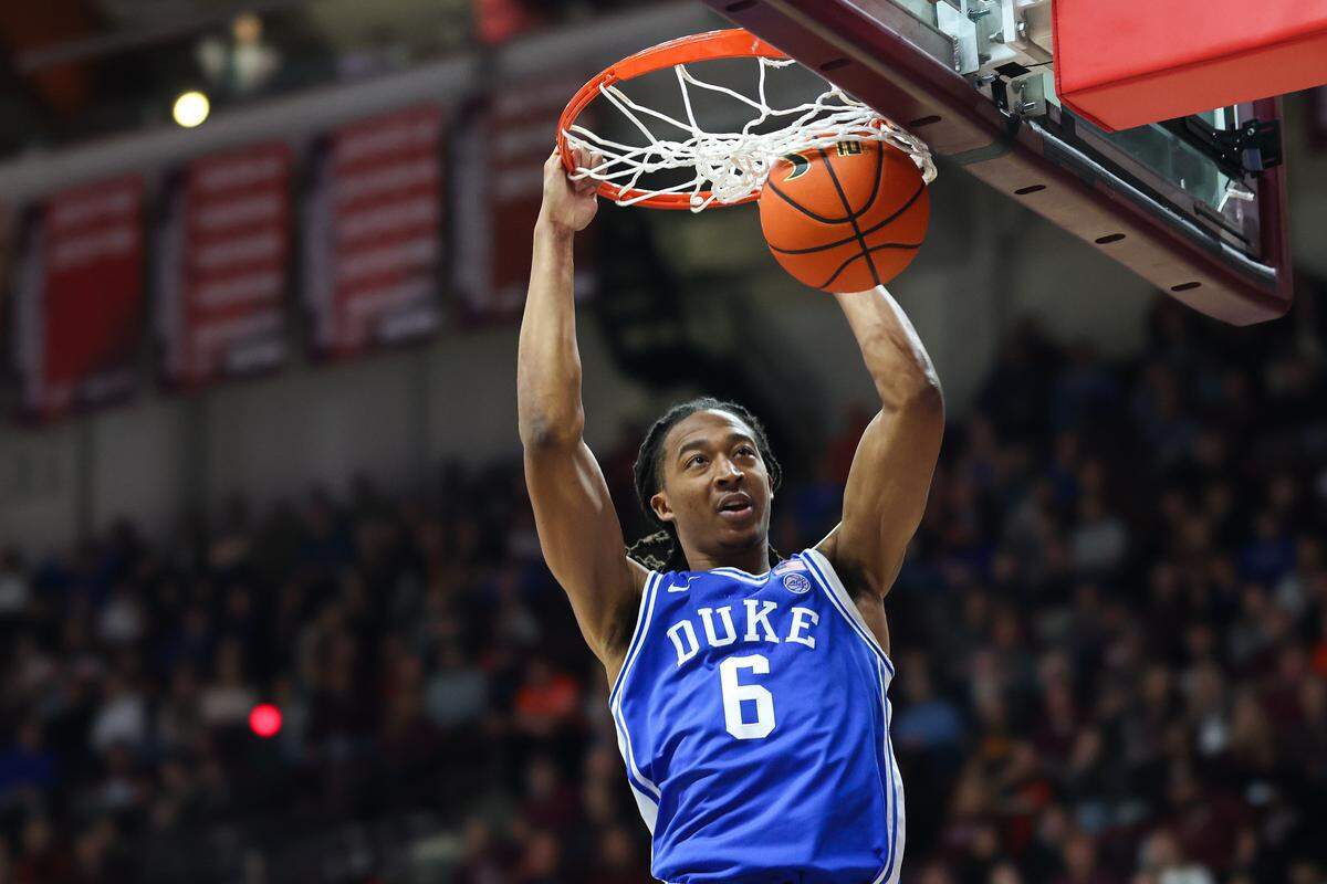 Duke’s Maliq Brown dunks in the second half during a game against the Virginia Tech.