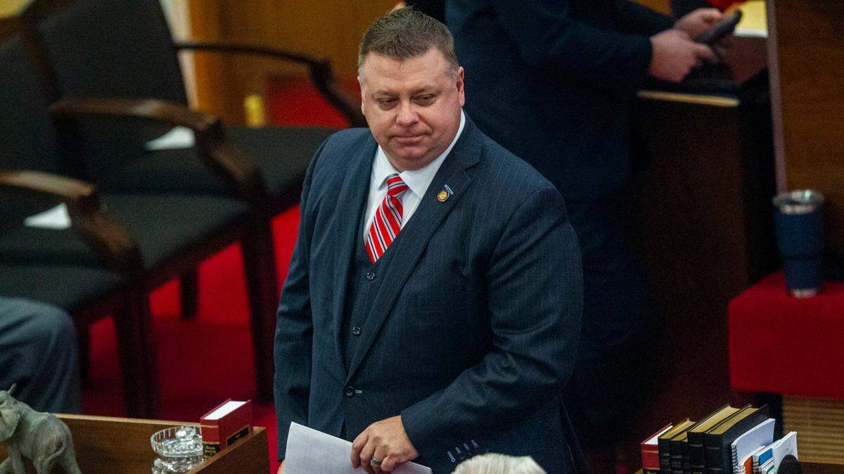 Jason Saine, at the time a state representative, walks to his desk after speaking in the House chamber on Jan. 13, 2021, at the North Carolina General Assembly.
