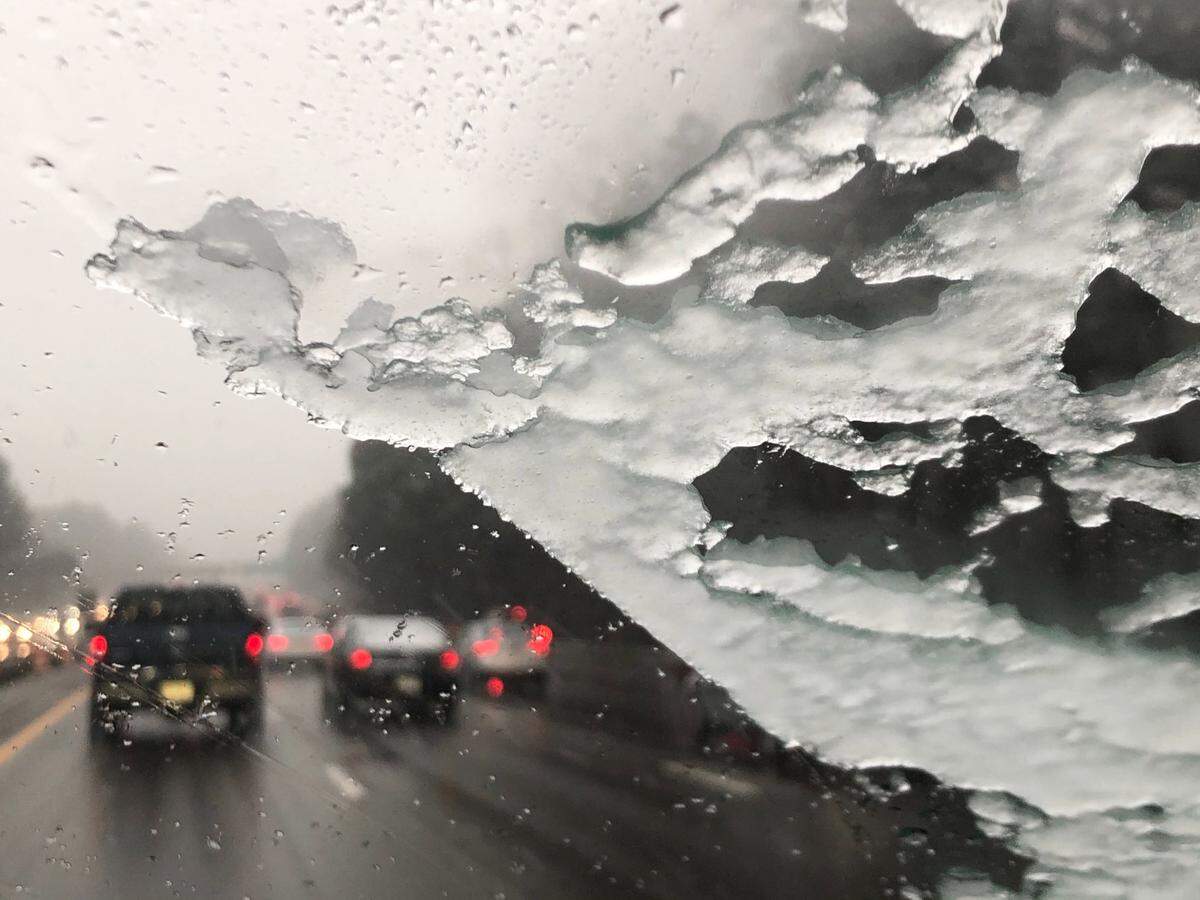 Traffic on I-40 westbound near RDU slows to a crawl as a wintery mix falls Thursday afternoon, Feb. 20, 2020.