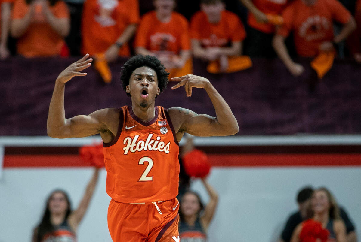 Virginia Tech’s M.J. Collins (2) reacts after sinking a three-point basket to give the Hokies a 35-23 lead in the first half on Sunday, December 4, 2022 at Cassell Coliseum in Blacksburg, Va.