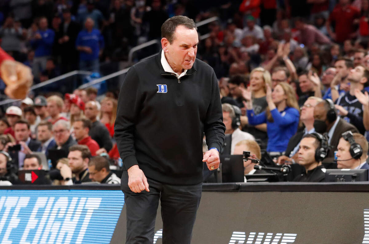 Duke head coach Mike Krzyzewski celebrates as time runs out in the game during Duke’s 78-69 victory over Arkansas in the NCAA Tournament West Regional finals at the Chase Center in San Francisco, Calif., Saturday, March 26, 2022.