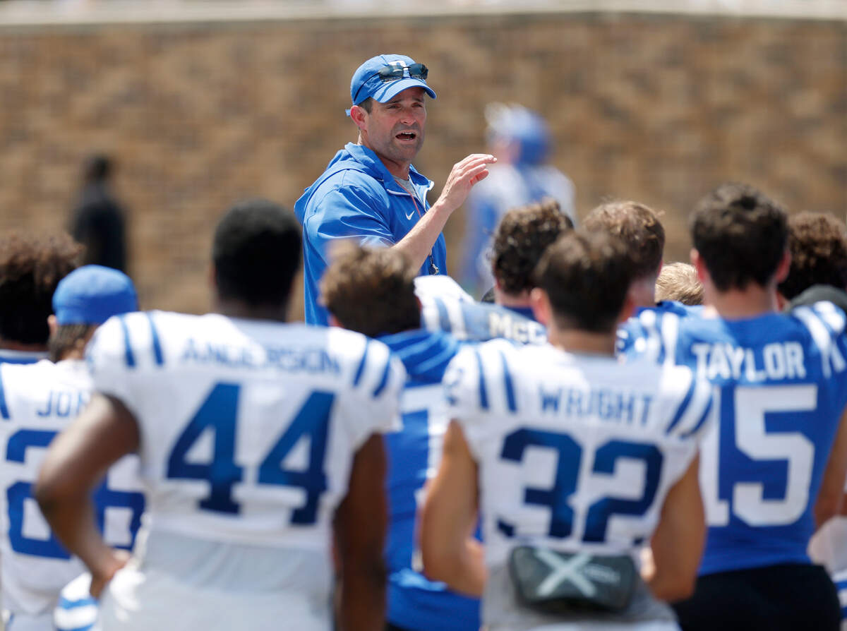 Duke head coach Manny Diaz speaks with his team following the Blue & White Game on Saturday, April 19, 2025, at Wallace Wade Stadium in Durham, N.C.