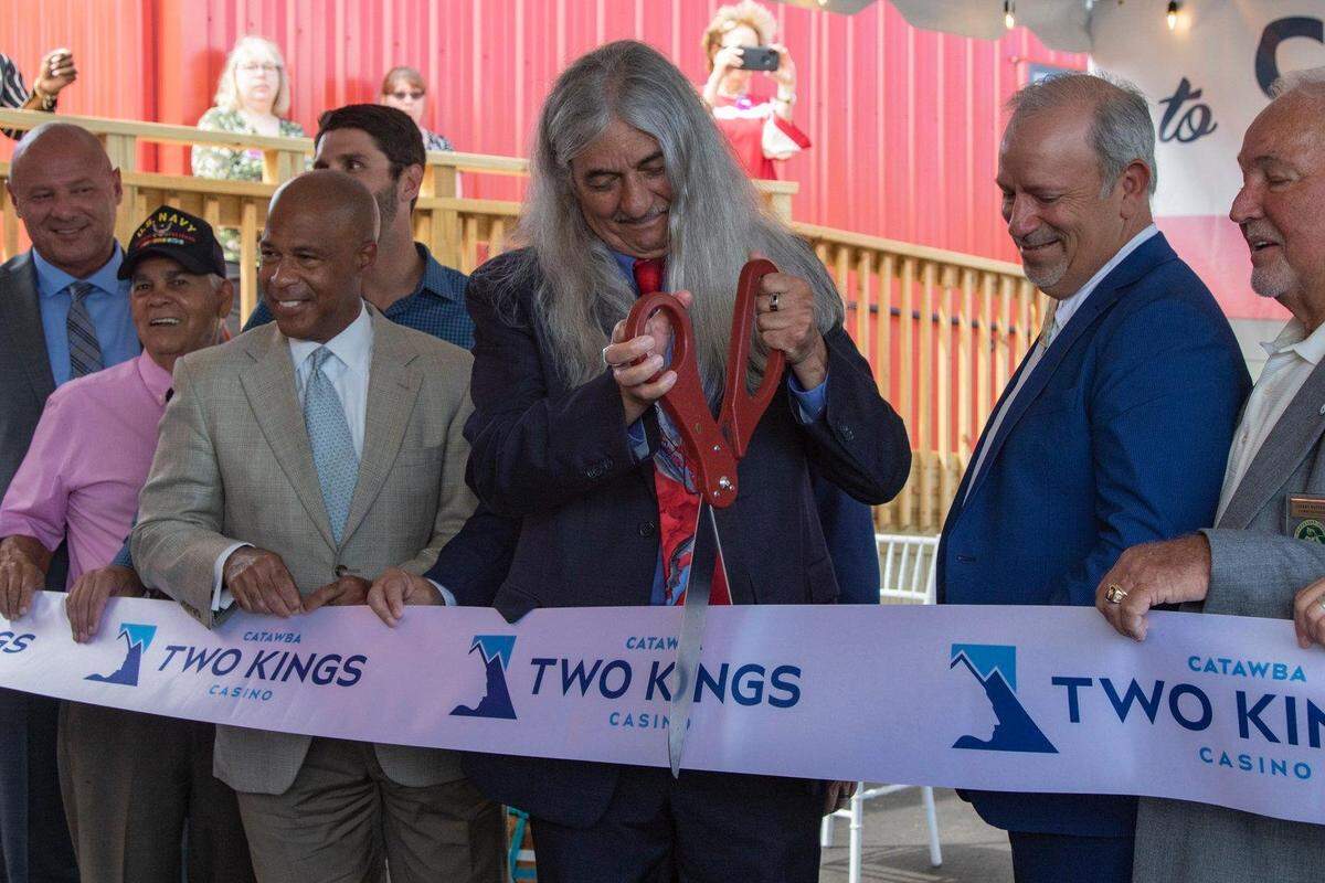 Former Catawba Chief Bill Harris cuts the ribbon on the opening day of the Catawba Two Kings Casino on July 1.