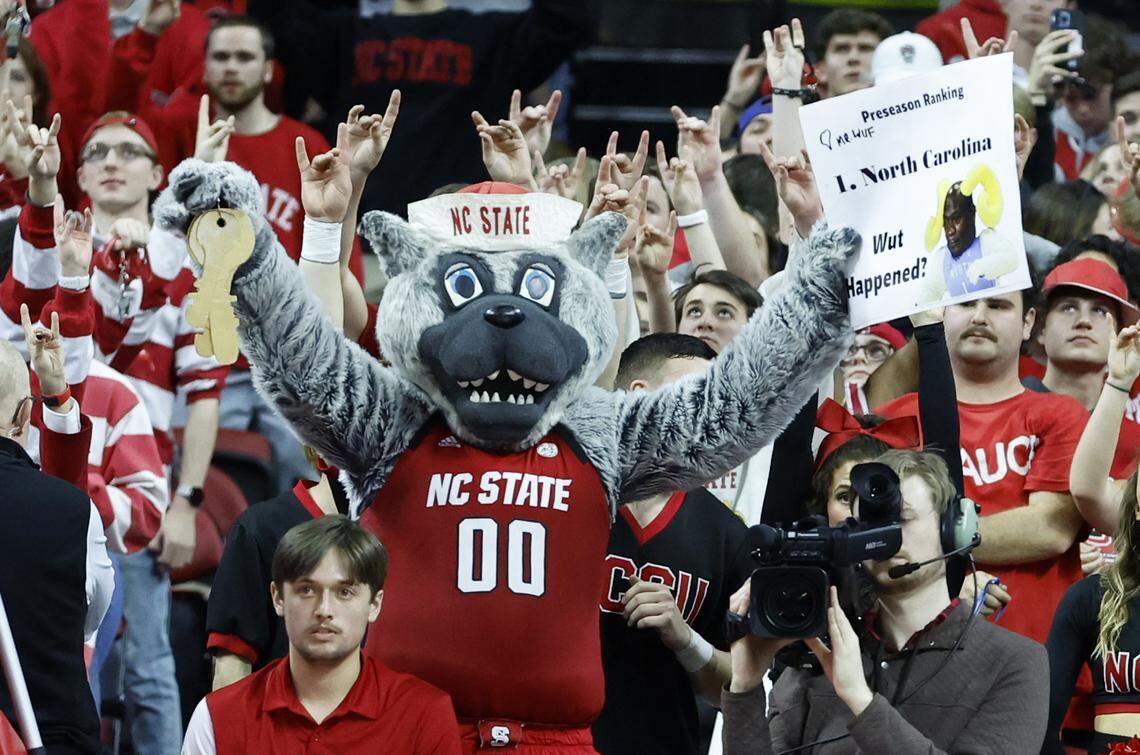Mr. Wuf cheers on the Wolfpack during the second half of N.C. State’s 77-69 victory over UNC at PNC Arena in Raleigh, N.C., Sunday, Feb. 19, 2023.