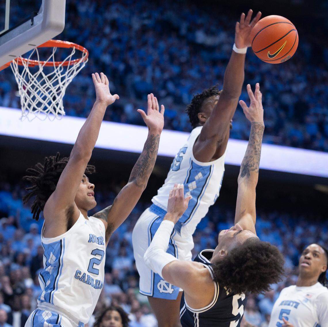 North Carolina’s Harrison Ingram (55) blocks a shot by Duke’s Tyrese Proctor (5) in the first half on Saturday, February, 3, 2024 at the Dean E. Smith Center in Chapel Hill, N.C.