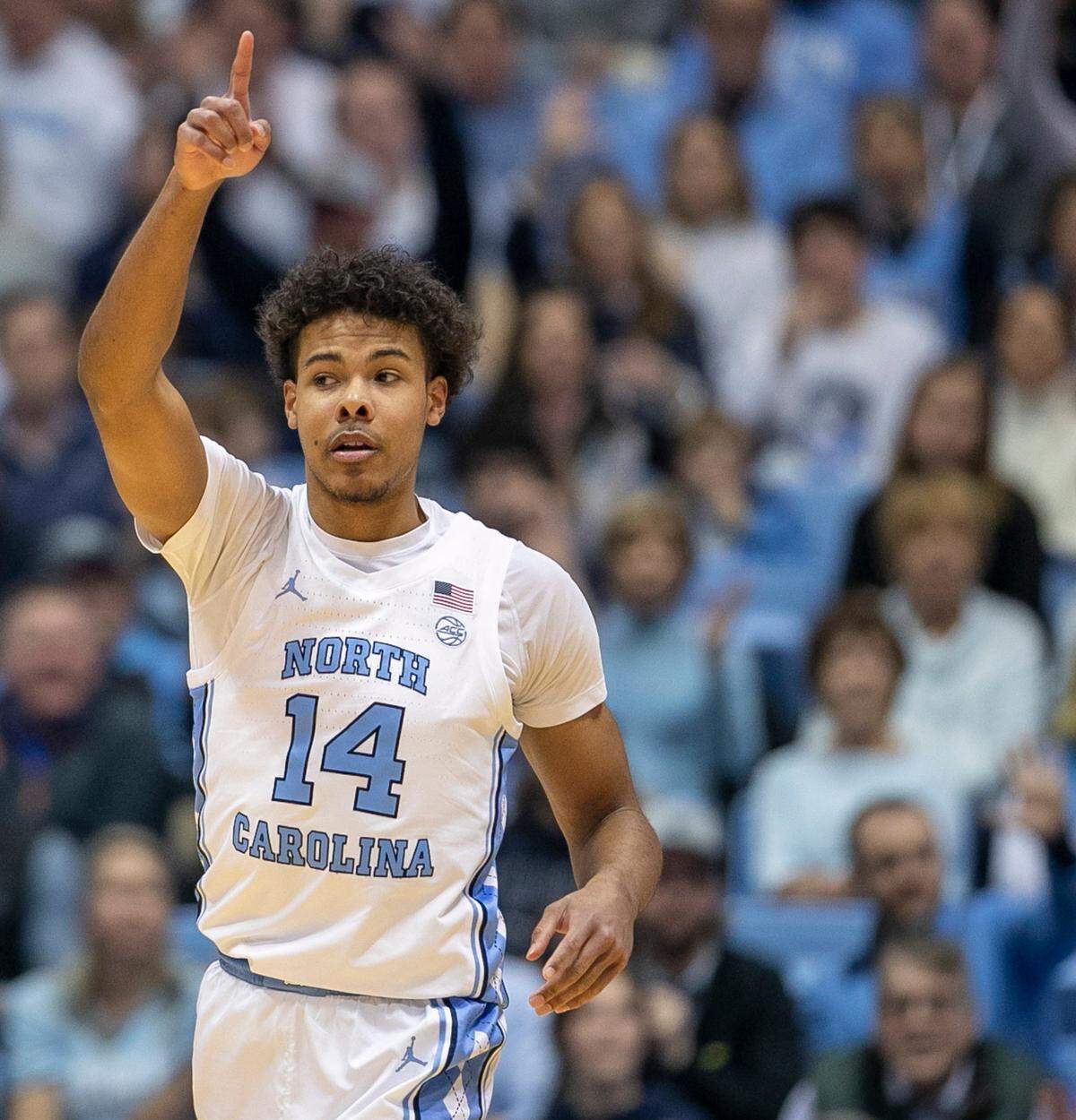 North Carolina’s Puff Johnson (14) reacts after a basket in the second half against Clemson on Saturday, February 11, 2023 at the Smith Center in Chapel Hill, N.C. Johnson scored eight points.