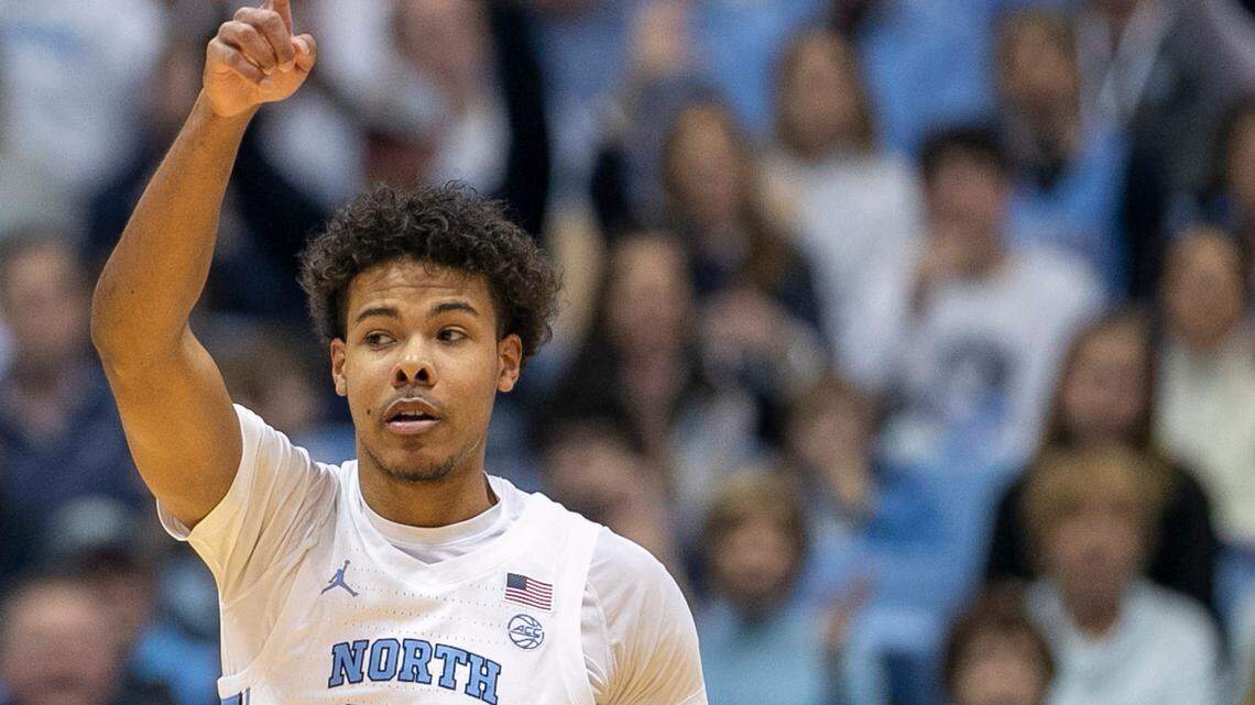 North Carolina’s Puff Johnson (14) reacts after a basket in the second half against Clemson on Saturday, February 11, 2023 at the Smith Center in Chapel Hill, N.C. Johnson scored eight points.