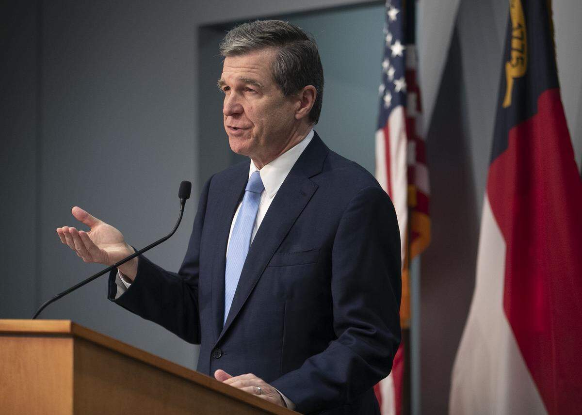 North Carolina Governor Roy Cooper updates the public during a press briefing on the COVID-19 virus on Thursday, April 30, 2020 at the Emergency Operations Center in Raleigh, N.C.