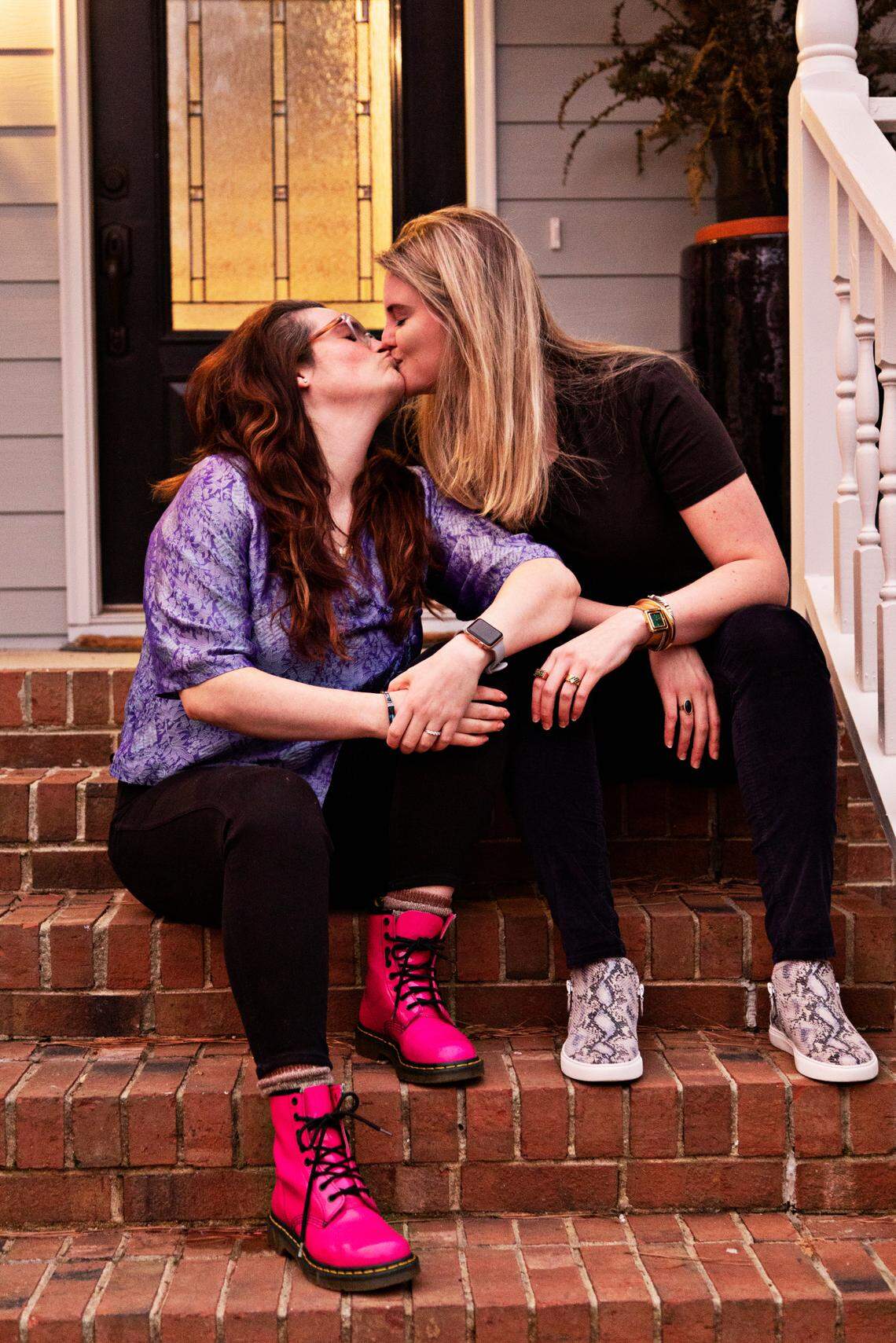 From left, Azul Zapata and Erica Rogers at their home in Raleigh on Friday, Jan. 28. 2022. Rogers, who is Canadian, and Zapata, who is Argentinian, recently bought their first home and plan to wed on Feb. 4, 2022.