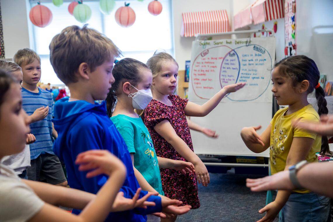 Most students in Holly Berk’s kindergarten class elected not to wear masks Monday, March 7, 2022 at Scotts Ridge Elementary in Apex. Monday marked the first day that face masks are now optional in Wake County schools.