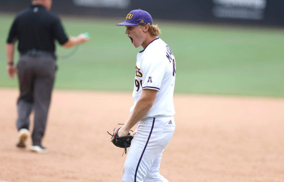 East Carolina’s Alec Makarewicz (99) celebrates after making a tough throw to force out Texas’ Douglas Hodo for the third out in the eighth inning during ECUs 13-7 victory over Texas in the Greenville Super Regional at Clark-LeClair Stadium Friday, June 10, 2022.