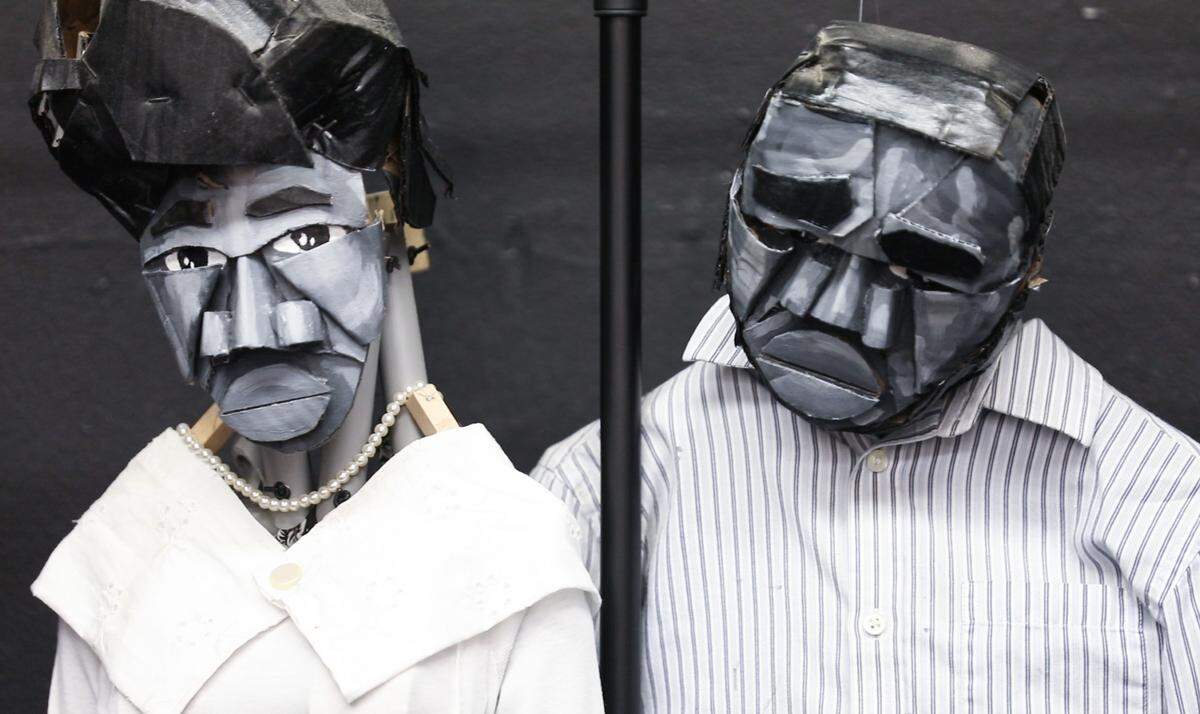 Two of the main characters in Jeghetto's "Just Another Lynching," Destiny Jones, left, and Cornelius Jones, right, sit on the stage at The Arts Center in Carrboro before a rehearsal on Thursday, May 31, 2018.  