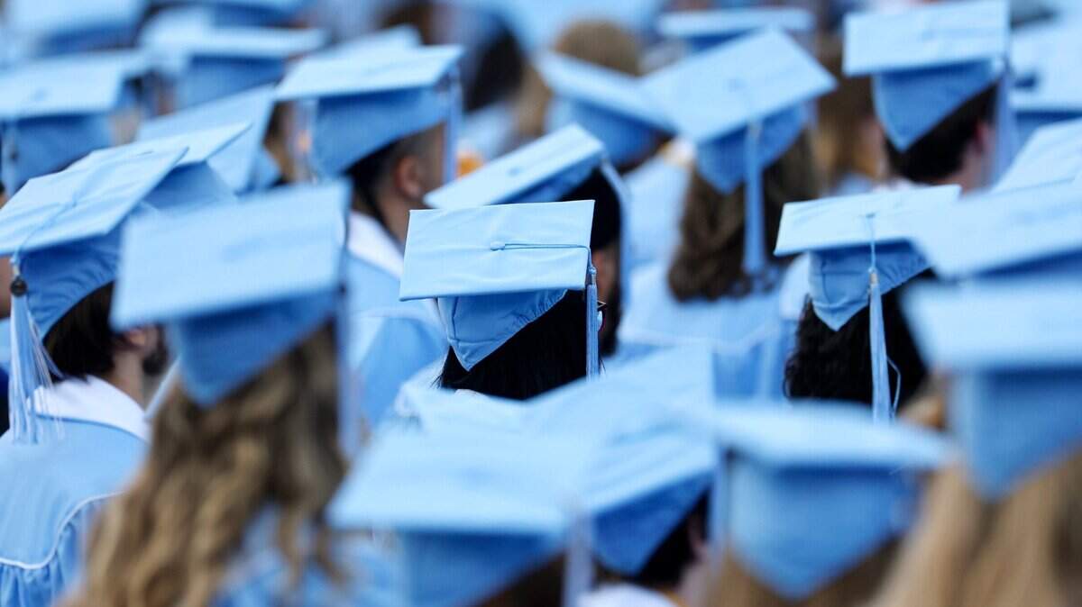 Graduates listen during UNC Chapel Hill’s commencement ceremonies at Kenan Stadium in Chapel Hill, N.C., Saturday, May 11, 2024.