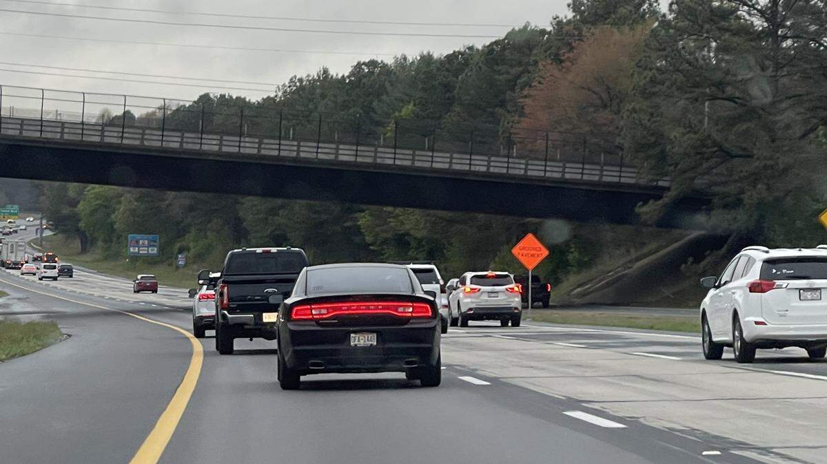 Traffic begins to back up behind a driver in the left lane of Interstate 40 near the Jones Franklin Road overpass. A bill in the General Assembly would make it illegal to drive in the left lane at a “speed that impedes the normal and reasonable movement of traffic.”