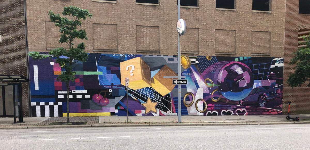 8 bit to 5G is an AR Mural by Taylor White featuring video game components from the history of video gaming. It can be seen at 429 S. Wilmington St.