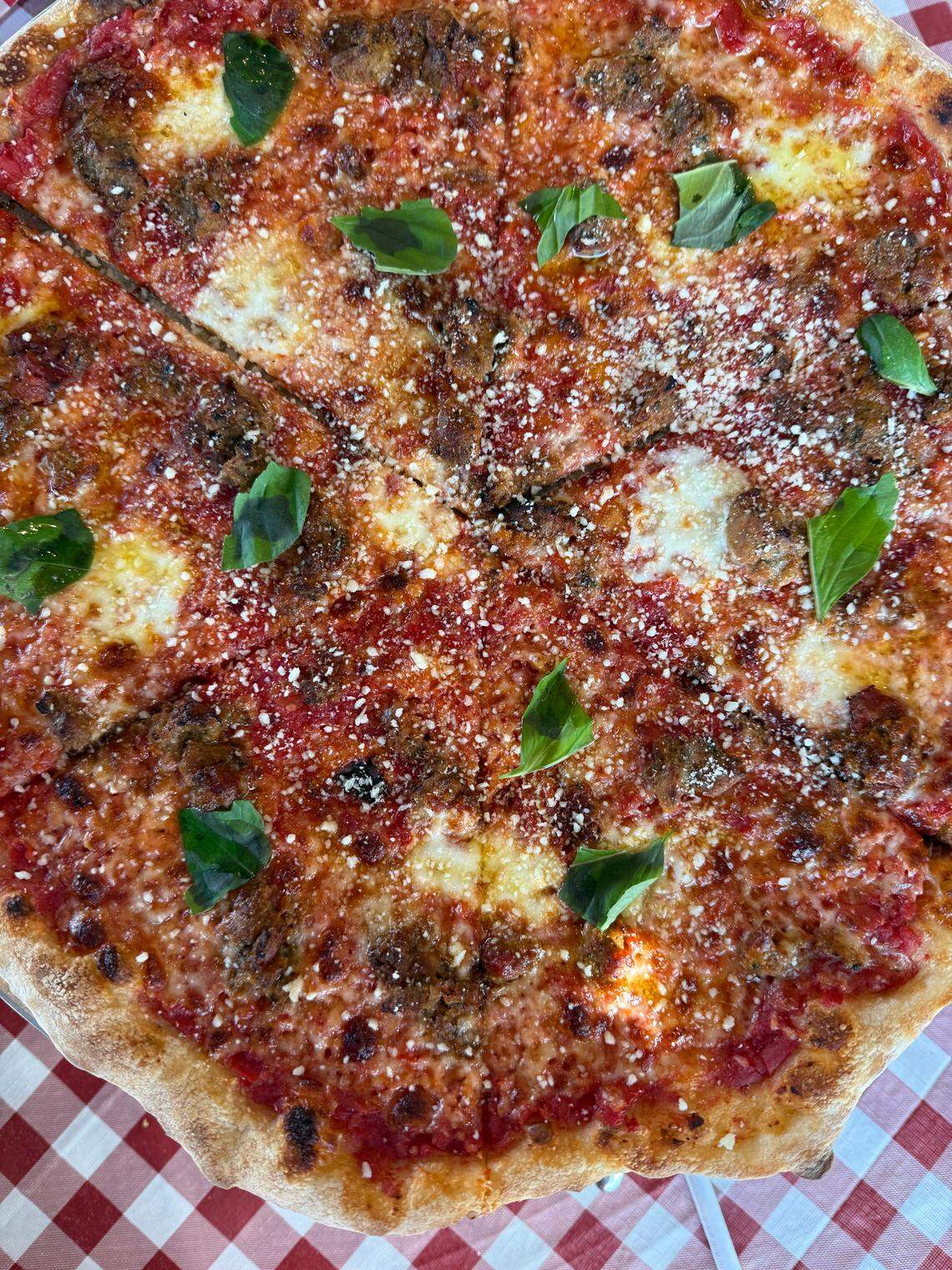 Dino’s Pizza opened in Durham in summer 2025, operated by chefs Tom Cuomo and Matt Kelly.