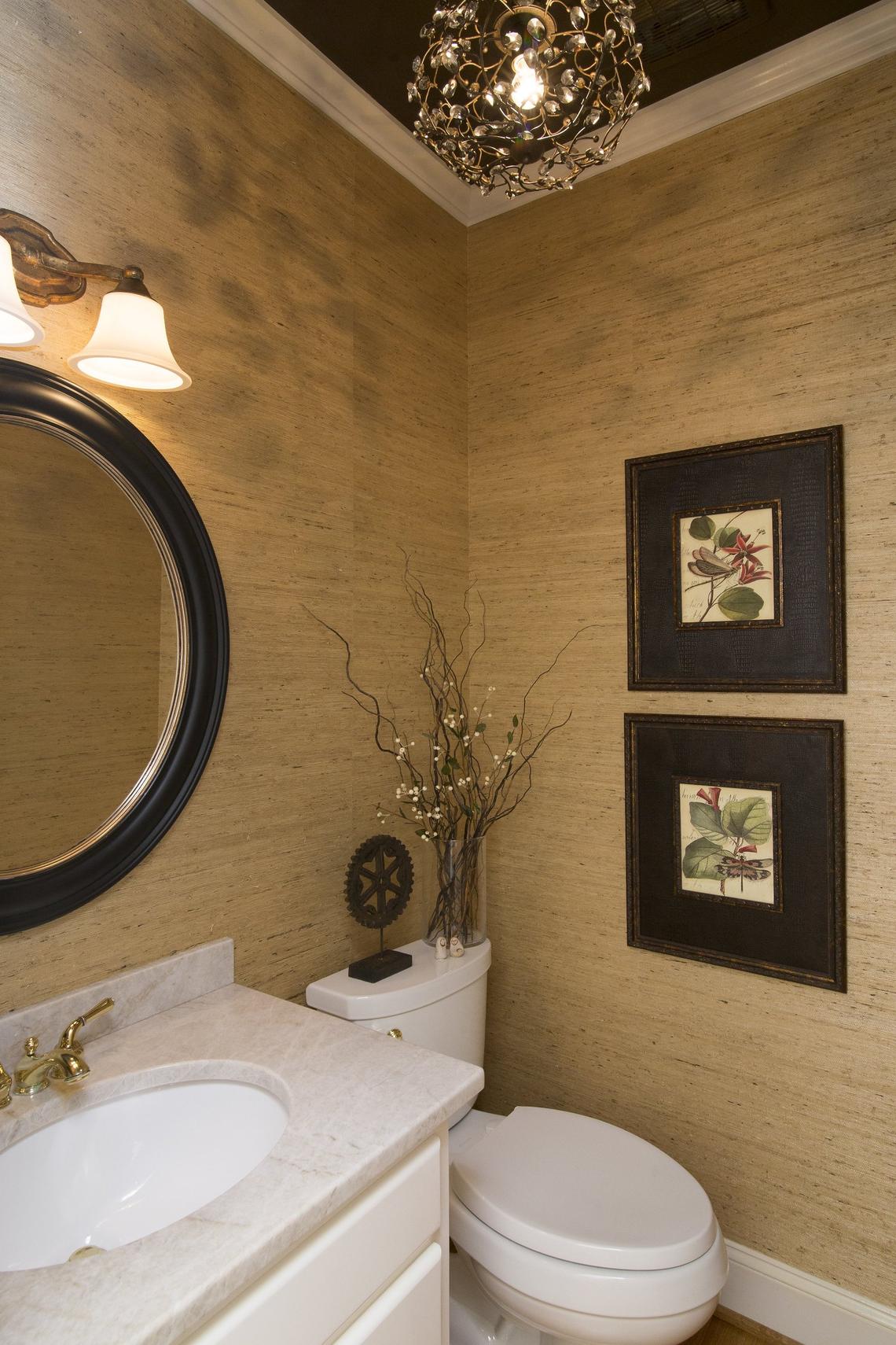 This beautiful grass cloth is by Philip Jeffries. Itâ€™s a classy vibe, but when adding a Sherwin Williams faux ceiling pared with an attractive chandelier the results are incredible. 