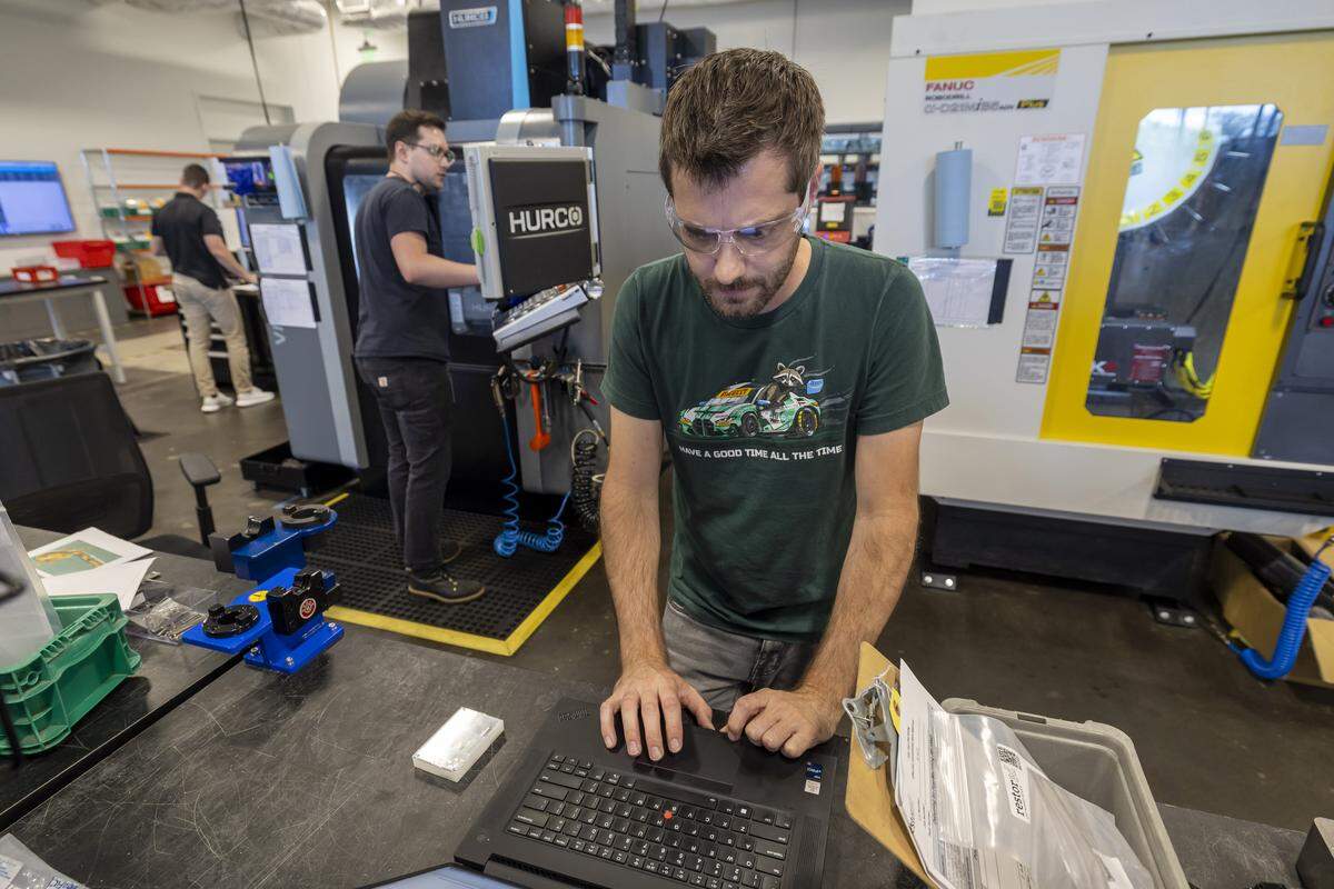 Manufacturing engineer Chris Cotrupi validates new programs for computer numeric control at restor3d in Durham, N.C.  Restor3d produces personalized, 3D-printed orthopedic implants and surgical instruments at its RTP facility. 
