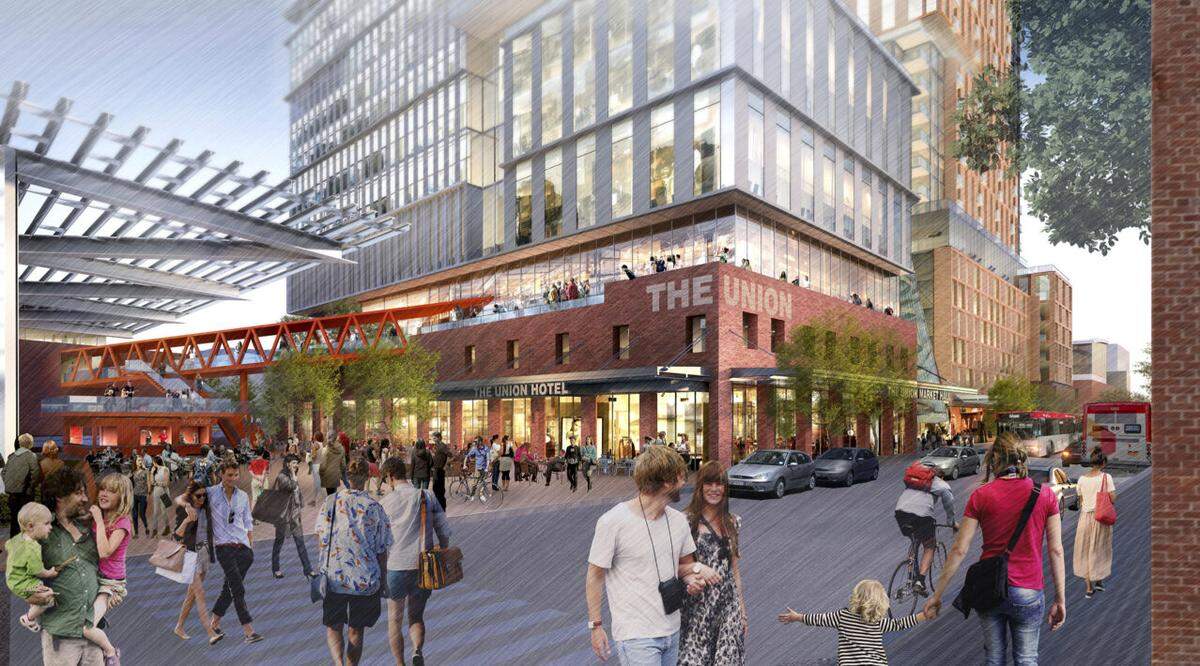 The RUSBus tower includes residential units, a hotel and a parking deck along with retail space.