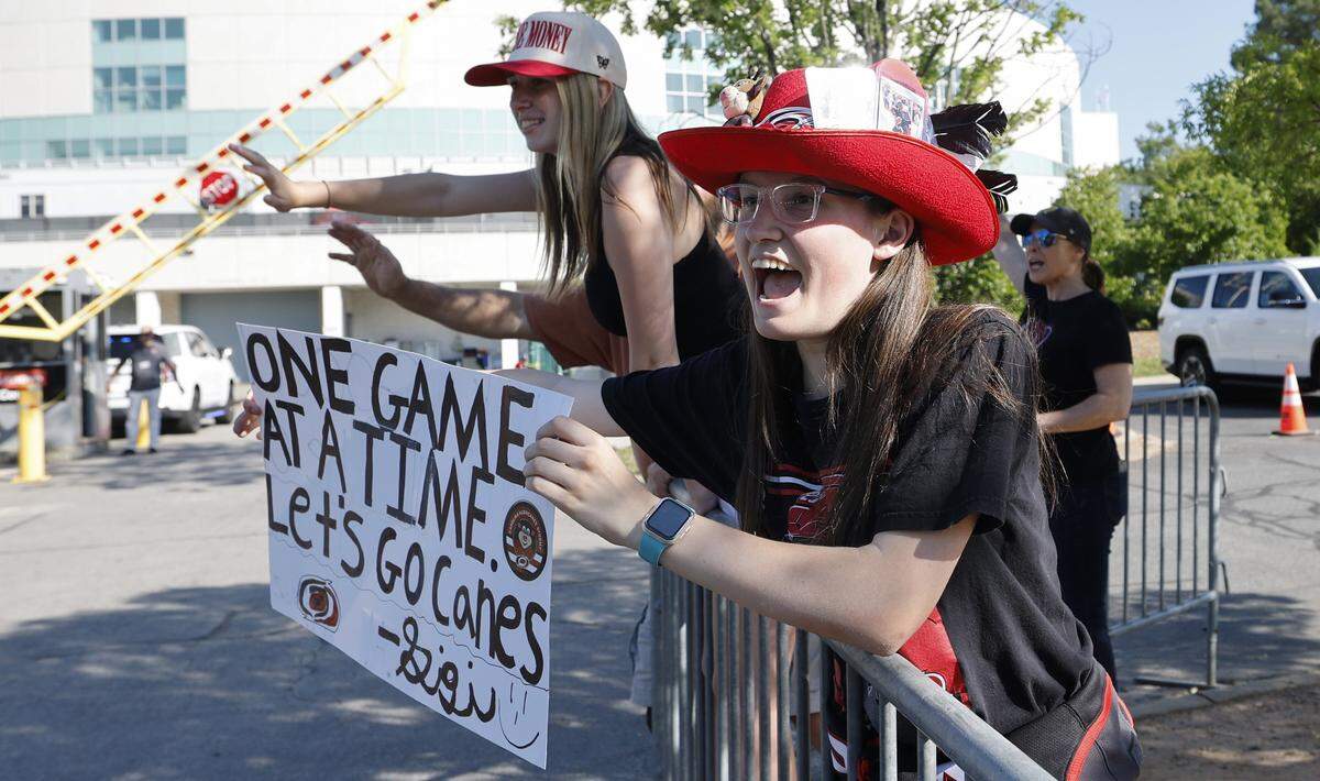 Gigi Rudolph of Greenville, N.C., cheers as players to arrive before the Hurricanes’ game against the Golden Knights in the second game of the Stanley Cup Final at the Lenovo Center in Raleigh, N.C., Thursday, June 4, 2026.