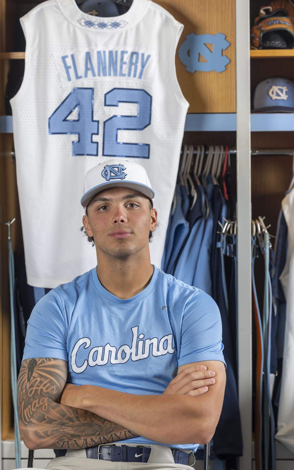 North Carolina pitcher Boston Flannery poses for a portrait in the Tar Heel’s locker room on Tuesday, April 14, 2026, at Boshamer Stadium in Chapel Hill, N.C. Flannery wears jersey #42, in honor of the legendary Jackie Robinson. 