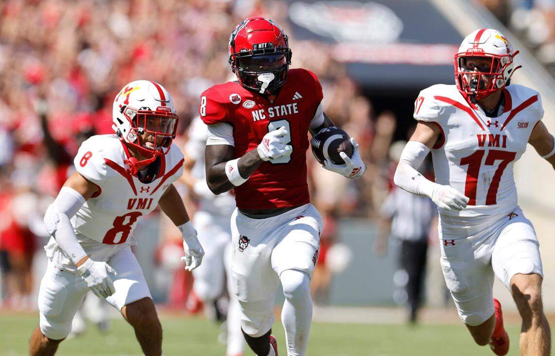 N.C. State wide receiver Julian Gray (8) runs for yards after making the reception during the first half of N.C. State’s game against VMI at Carter-Finley Stadium in Raleigh, N.C., Saturday, Sept. 16, 2023.