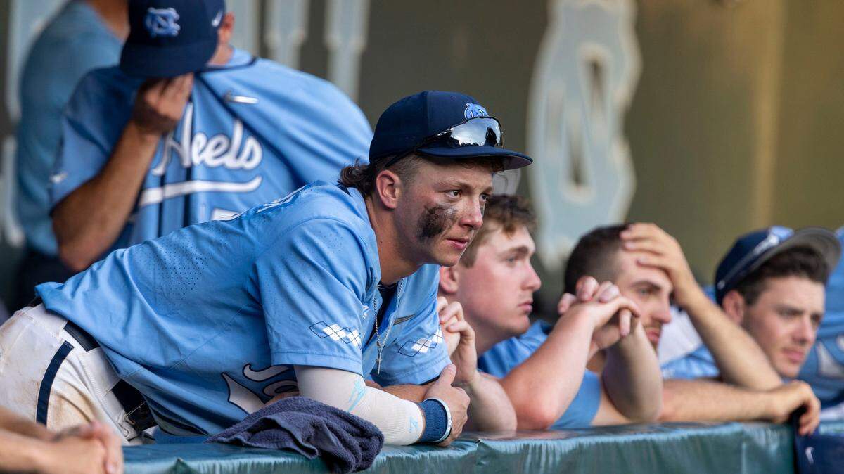 North Carolina’s Vance Honeycutt (7) and his teammates react following their 4-3 loss to Arkansas in the NCAA Super Regional series on Sunday, June 12, 2022 at Boshamer Stadium in Chapel Hill, N.C. The Tar Heels dropped two game in a row and are eliminated from the playoffs.