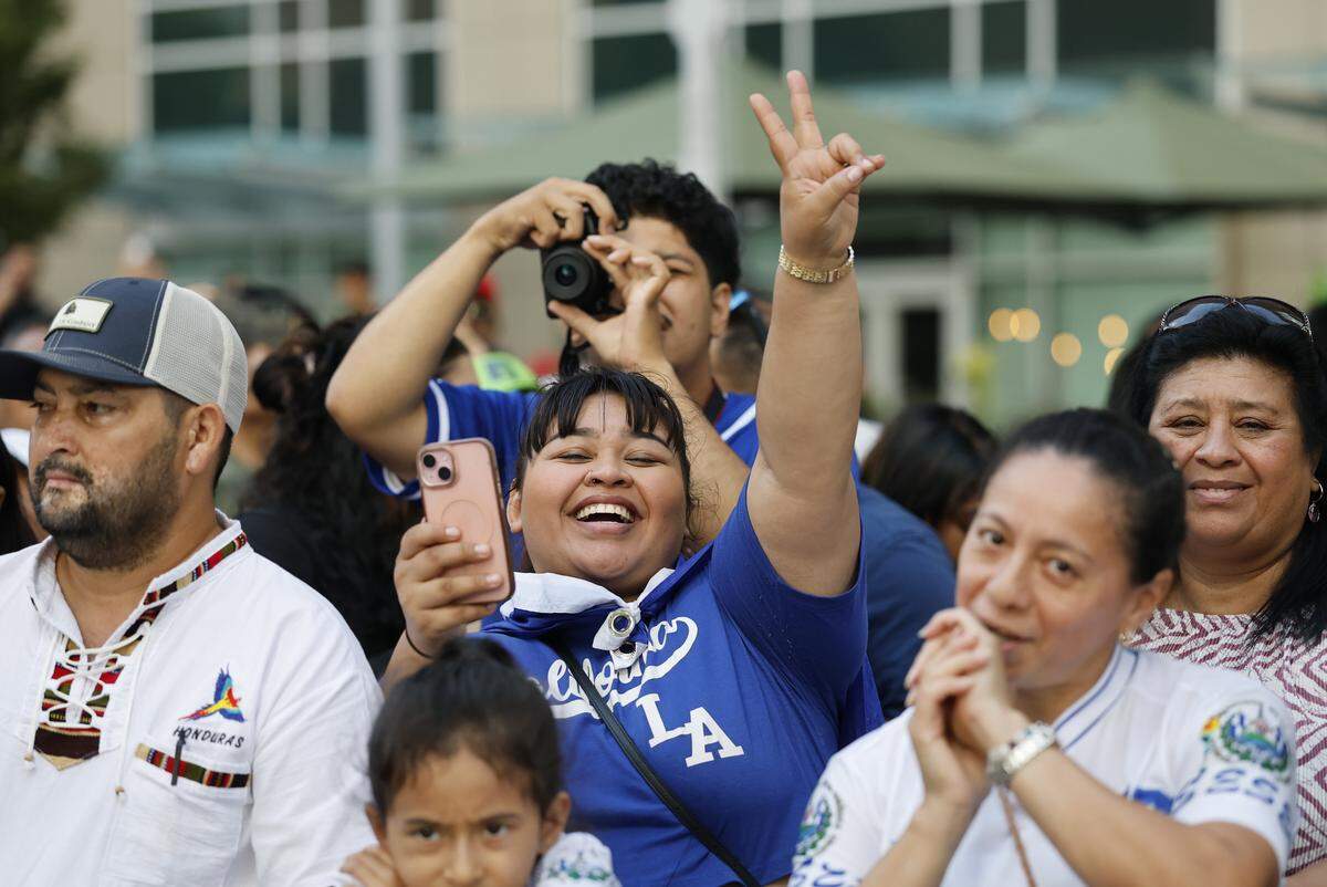 Crowds listen to Monchy as he plays during the La Fiesta Del Pueblo 2025 on Fayetteville St. in downtown Raleigh, Sunday, Sept. 21, 2025. One of the state’s largest Latin American festivals has been held in the Triangle for 30 years, including with virtual festivals during the COVID-19 pandemic.