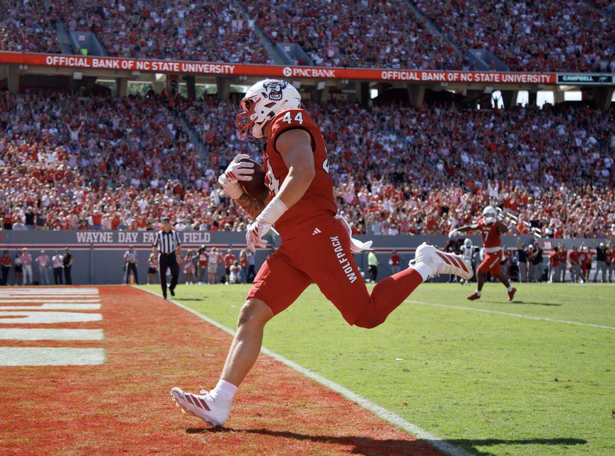 N.C. State’s Cody Hardy runs the ball into the end zone during the first half of the Wolfpack’s game against Campbell on Saturday, Oct. 4, 2025, at Carter-Finley Stadium in Raleigh, N.C.